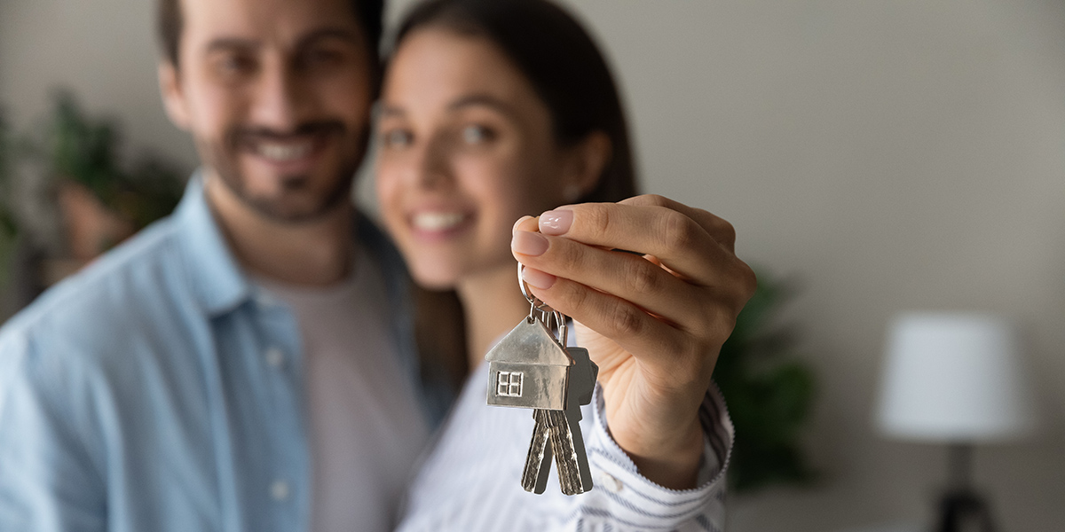 Young couple with house keys